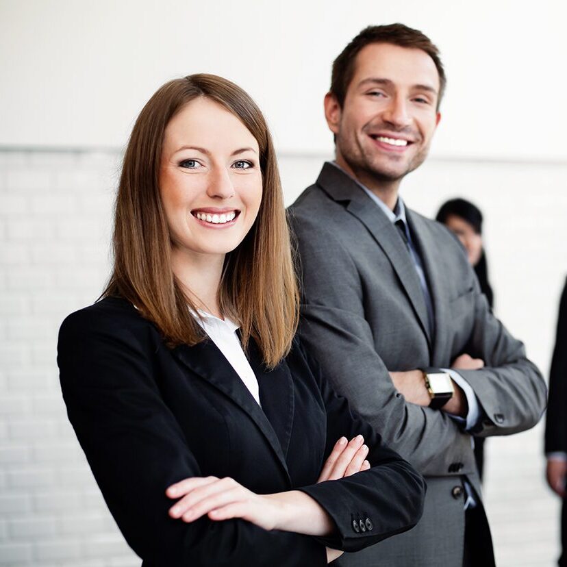 Group of business people with female leader in foreground